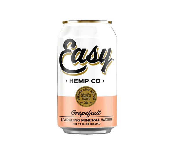 A can of Easy Hemp Co. Grapefruit Sparkling Mineral Water with a white and pink color scheme.